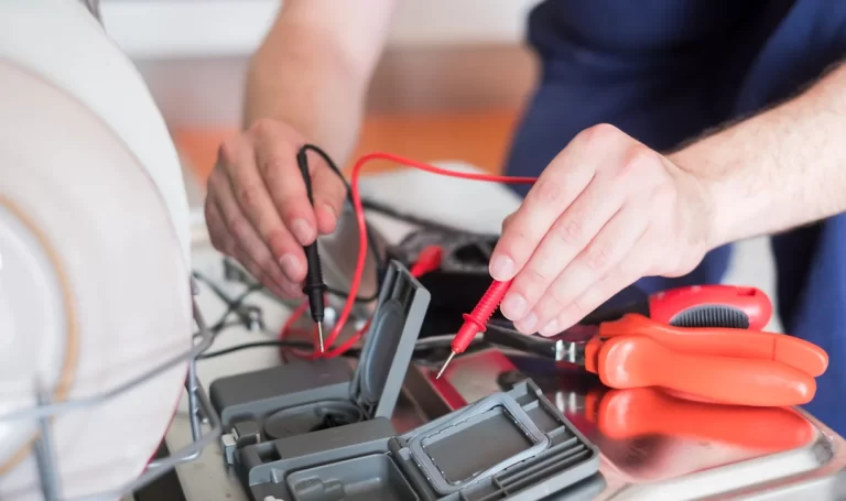 man testing appliance electricity