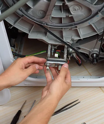 Man repairing washer