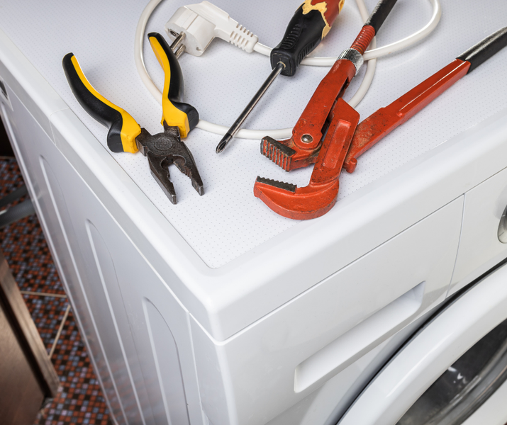 tools laying on top of an appliance