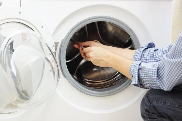 Man fixing washer