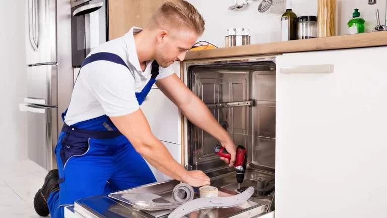 Man working on appliance