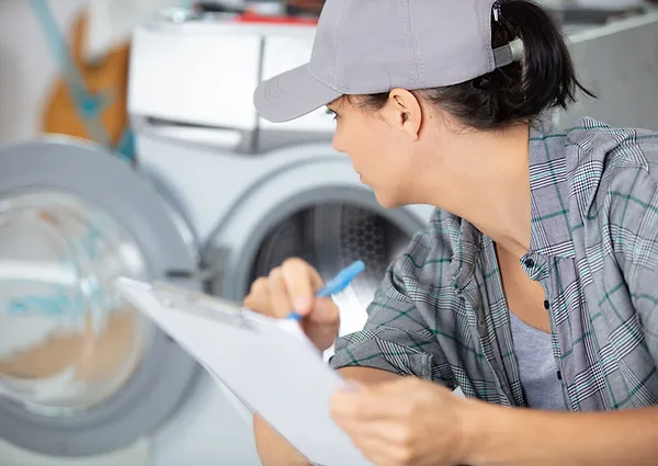 Woman reviewing a checklist